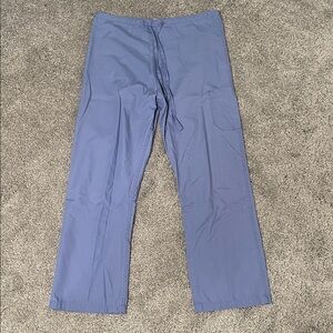Women’s blue medical scrub pants with side pocket